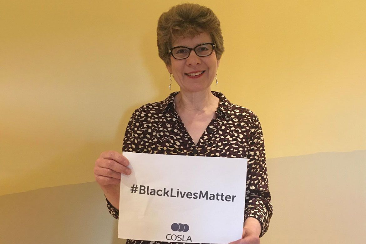 Councillor Alison Evison holds Black Lives Matter sign