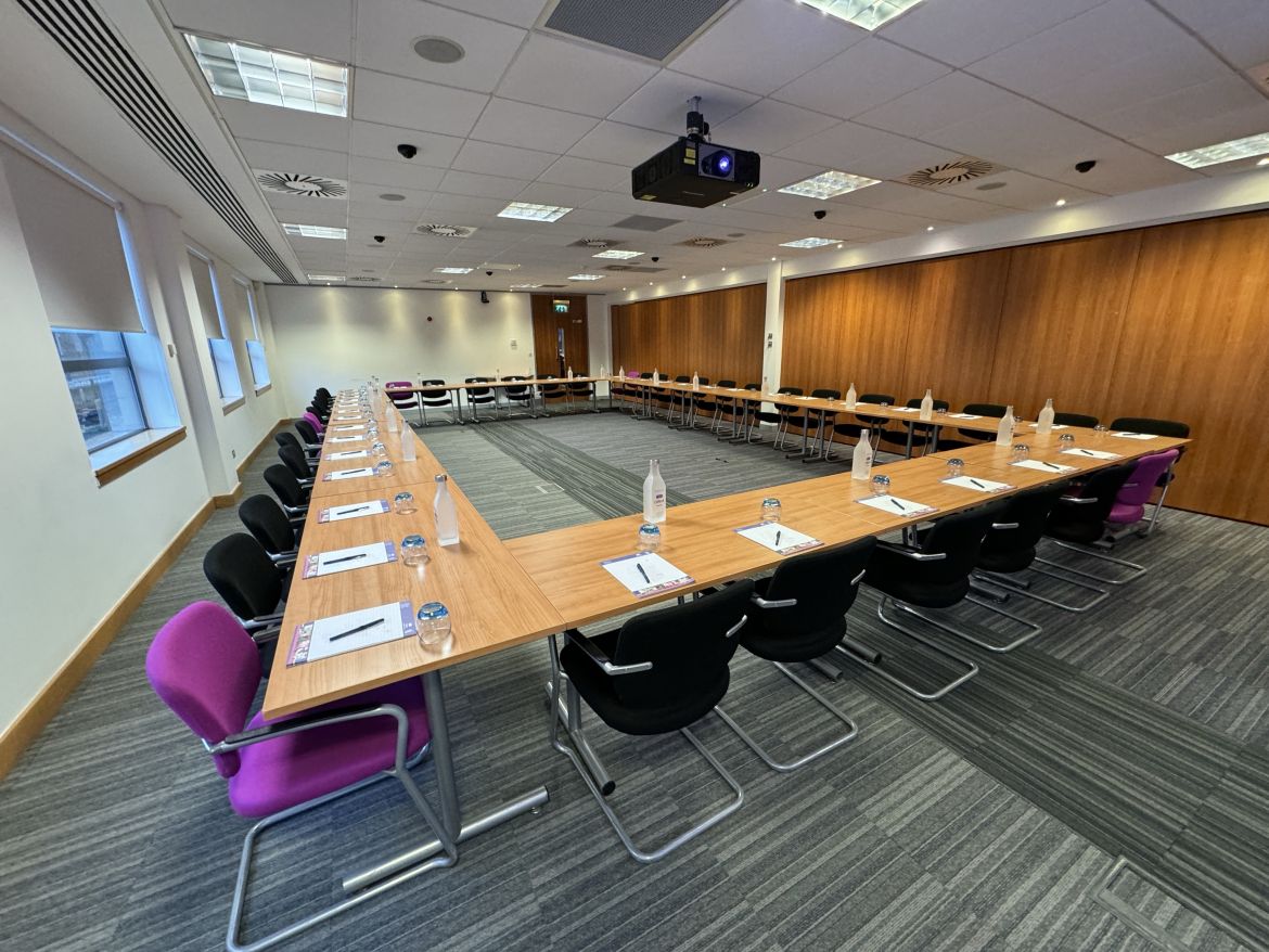 The Caledonian II Suite in the COSLA Conference Centre in a boardroom style.